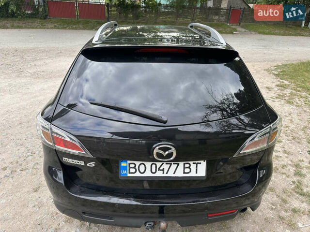 Черный Мазда 6, объемом двигателя 2.18 л и пробегом 321 тыс. км за 6400 $, фото 2 на Automoto.ua