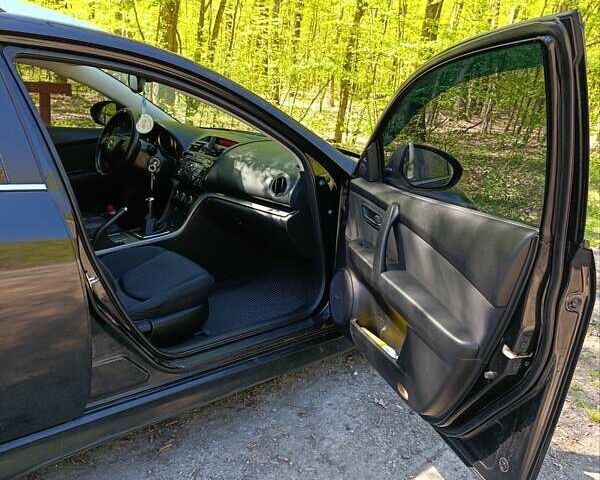 Черный Мазда 6, объемом двигателя 2.18 л и пробегом 282 тыс. км за 7600 $, фото 10 на Automoto.ua