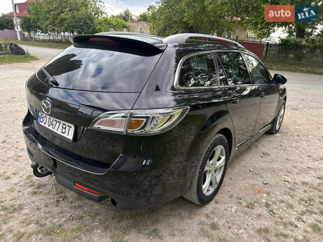 Черный Мазда 6, объемом двигателя 2.18 л и пробегом 321 тыс. км за 6400 $, фото 4 на Automoto.ua