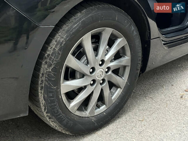 Черный Мазда 6, объемом двигателя 2.18 л и пробегом 234 тыс. км за 6850 $, фото 11 на Automoto.ua