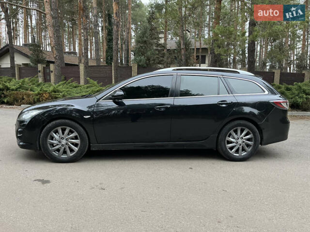 Черный Мазда 6, объемом двигателя 2.18 л и пробегом 234 тыс. км за 6850 $, фото 7 на Automoto.ua