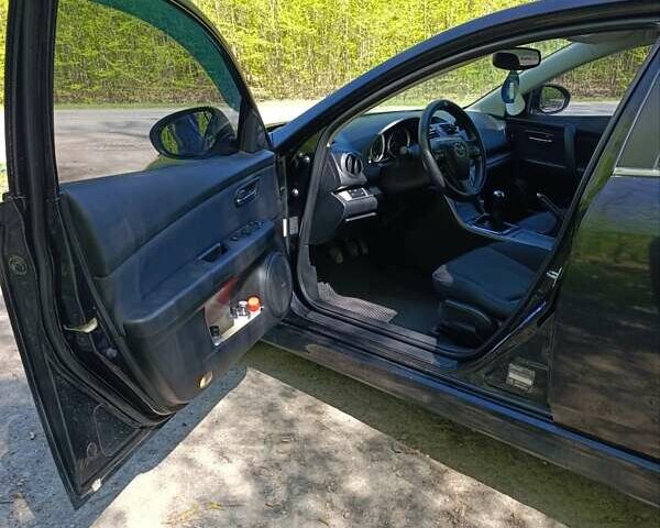 Черный Мазда 6, объемом двигателя 2.18 л и пробегом 282 тыс. км за 7600 $, фото 6 на Automoto.ua