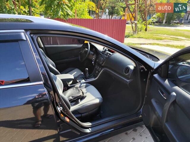 Черный Мазда 6, объемом двигателя 2.2 л и пробегом 248 тыс. км за 8500 $, фото 7 на Automoto.ua