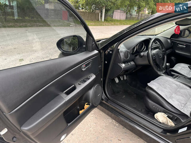 Черный Мазда 6, объемом двигателя 2.18 л и пробегом 321 тыс. км за 6400 $, фото 13 на Automoto.ua