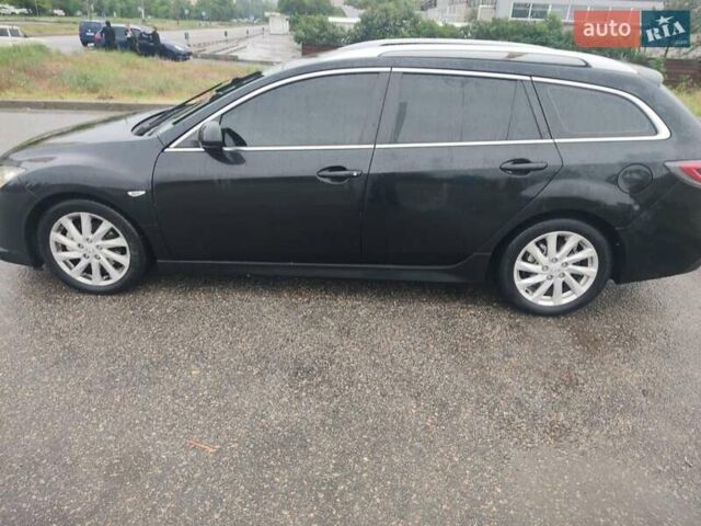 Черный Мазда 6, объемом двигателя 2.18 л и пробегом 233 тыс. км за 7400 $, фото 4 на Automoto.ua