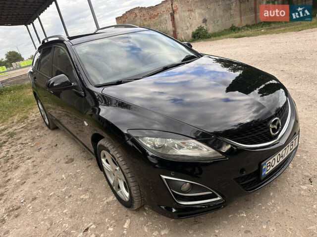 Черный Мазда 6, объемом двигателя 2.18 л и пробегом 321 тыс. км за 6400 $, фото 6 на Automoto.ua