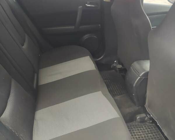 Черный Мазда 6, объемом двигателя 2.2 л и пробегом 305 тыс. км за 7200 $, фото 3 на Automoto.ua