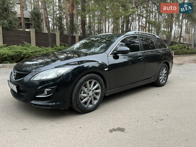 Черный Мазда 6, объемом двигателя 2.18 л и пробегом 234 тыс. км за 6850 $, фото 6 на Automoto.ua