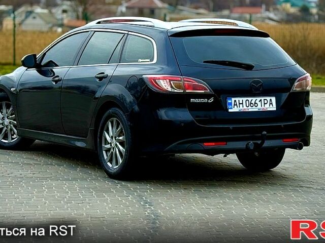 Чорний Мазда 6, об'ємом двигуна 2.2 л та пробігом 235 тис. км за 6200 $, фото 4 на Automoto.ua