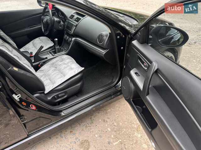 Черный Мазда 6, объемом двигателя 2.18 л и пробегом 321 тыс. км за 6400 $, фото 20 на Automoto.ua