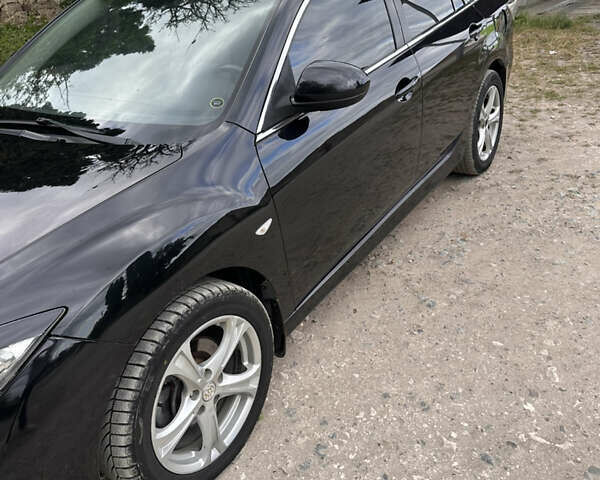 Черный Мазда 6, объемом двигателя 2.18 л и пробегом 321 тыс. км за 6400 $, фото 11 на Automoto.ua