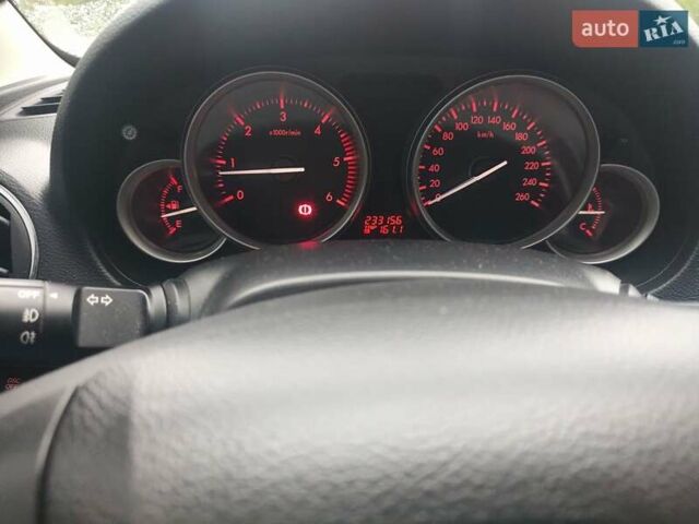 Черный Мазда 6, объемом двигателя 2.18 л и пробегом 233 тыс. км за 7400 $, фото 1 на Automoto.ua