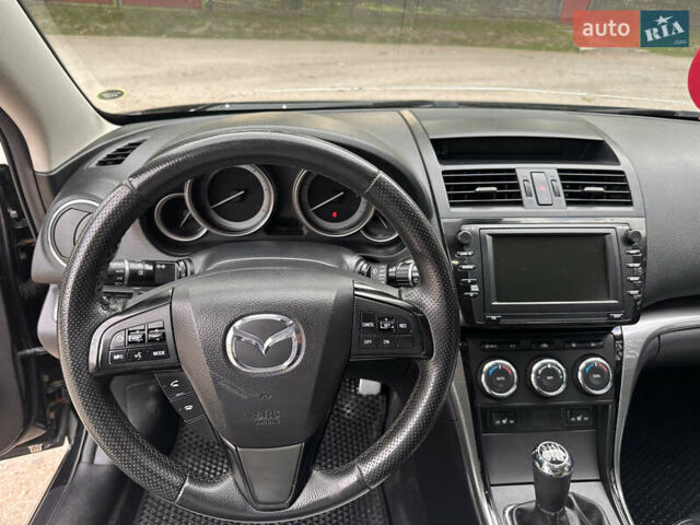 Черный Мазда 6, объемом двигателя 2.18 л и пробегом 321 тыс. км за 6400 $, фото 16 на Automoto.ua