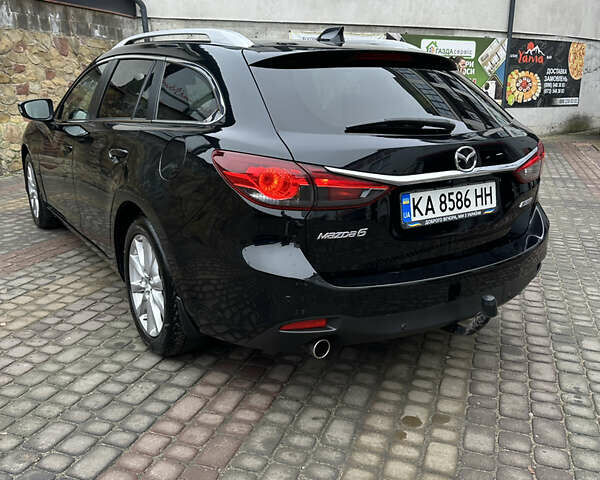 Черный Мазда 6, объемом двигателя 2.2 л и пробегом 266 тыс. км за 10600 $, фото 5 на Automoto.ua