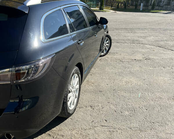 Черный Мазда 6, объемом двигателя 2.2 л и пробегом 266 тыс. км за 8500 $, фото 7 на Automoto.ua