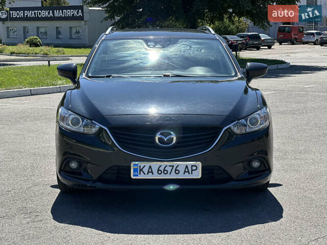 Черный Мазда 6, объемом двигателя 2.19 л и пробегом 220 тыс. км за 9900 $, фото 1 на Automoto.ua