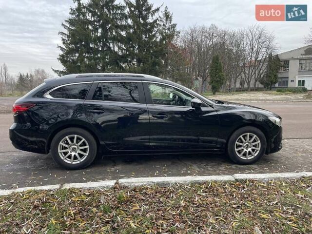 Черный Мазда 6, объемом двигателя 2.18 л и пробегом 240 тыс. км за 9500 $, фото 9 на Automoto.ua