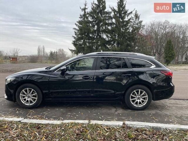 Черный Мазда 6, объемом двигателя 2.18 л и пробегом 240 тыс. км за 9500 $, фото 2 на Automoto.ua