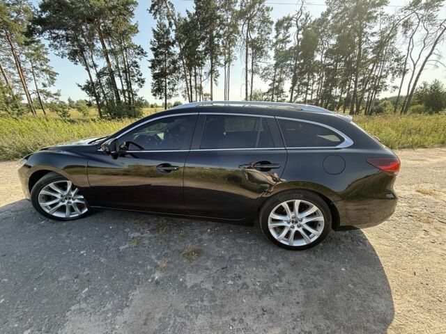 Черный Мазда 6, объемом двигателя 2.2 л и пробегом 272 тыс. км за 12500 $, фото 7 на Automoto.ua