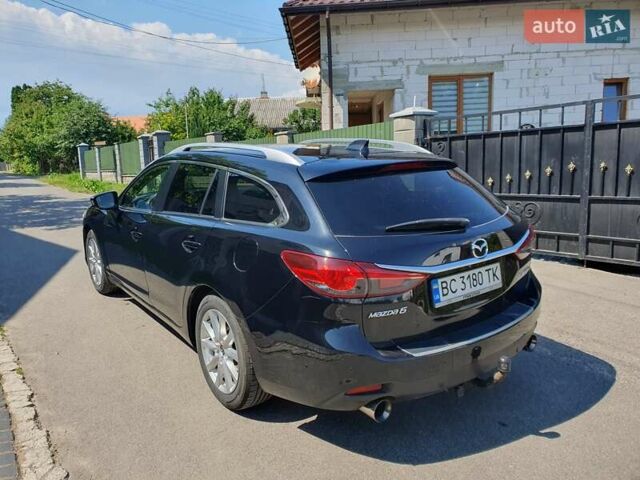 Черный Мазда 6, объемом двигателя 2.19 л и пробегом 291 тыс. км за 11800 $, фото 4 на Automoto.ua