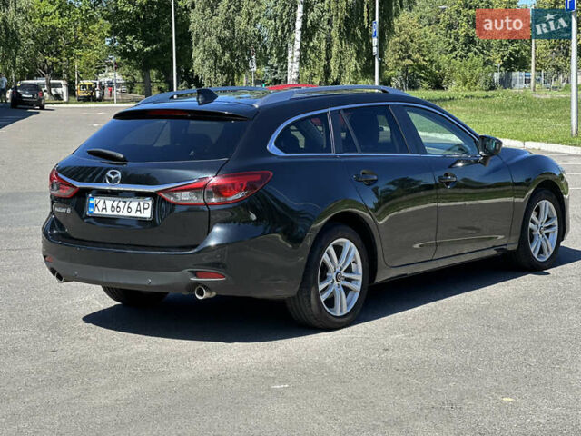 Черный Мазда 6, объемом двигателя 2.19 л и пробегом 220 тыс. км за 9900 $, фото 3 на Automoto.ua