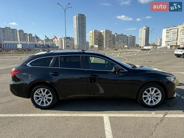 Черный Мазда 6, объемом двигателя 2.19 л и пробегом 234 тыс. км за 11000 $, фото 5 на Automoto.ua