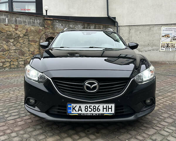 Черный Мазда 6, объемом двигателя 2.2 л и пробегом 266 тыс. км за 10600 $, фото 1 на Automoto.ua