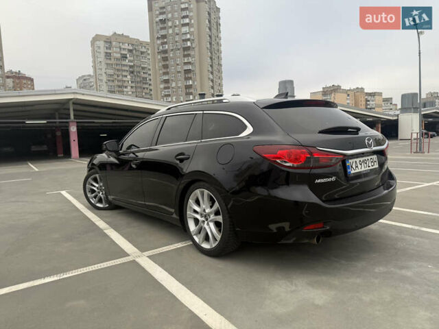 Черный Мазда 6, объемом двигателя 2.19 л и пробегом 261 тыс. км за 11000 $, фото 6 на Automoto.ua