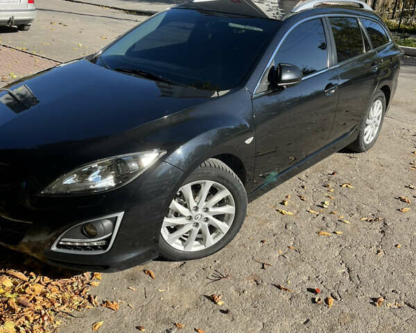 Черный Мазда 6, объемом двигателя 2.2 л и пробегом 266 тыс. км за 8500 $, фото 1 на Automoto.ua