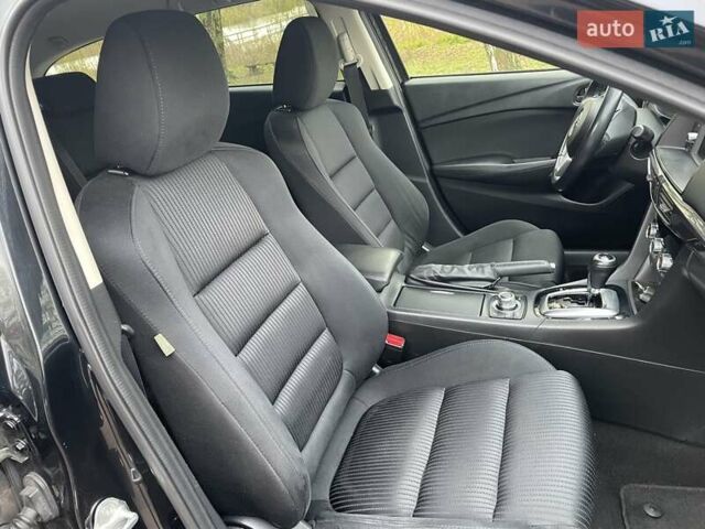 Черный Мазда 6, объемом двигателя 2.18 л и пробегом 240 тыс. км за 9500 $, фото 16 на Automoto.ua