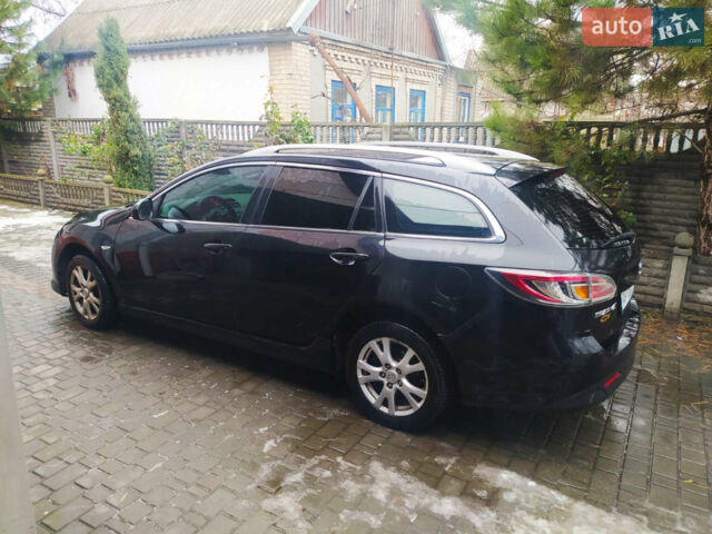 Черный Мазда 6, объемом двигателя 2.18 л и пробегом 280 тыс. км за 6800 $, фото 4 на Automoto.ua