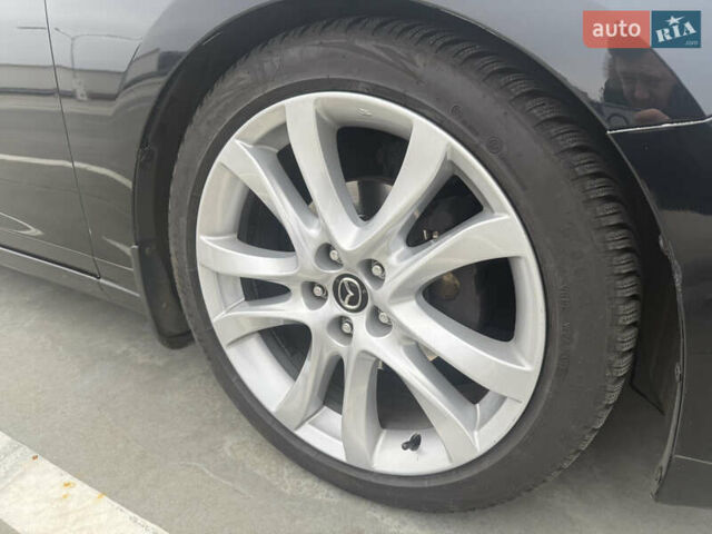 Черный Мазда 6, объемом двигателя 2.19 л и пробегом 261 тыс. км за 11000 $, фото 4 на Automoto.ua