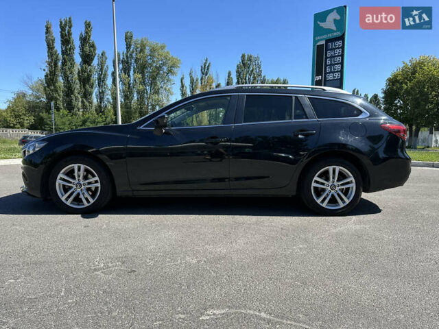Черный Мазда 6, объемом двигателя 2.19 л и пробегом 220 тыс. км за 9900 $, фото 6 на Automoto.ua