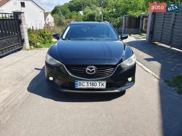 Черный Мазда 6, объемом двигателя 2.19 л и пробегом 291 тыс. км за 11800 $, фото 1 на Automoto.ua