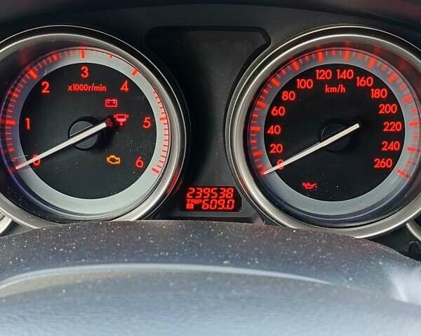 Черный Мазда 6, объемом двигателя 2.2 л и пробегом 239 тыс. км за 7000 $, фото 4 на Automoto.ua