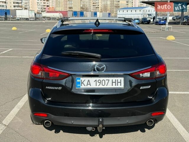 Черный Мазда 6, объемом двигателя 2.19 л и пробегом 234 тыс. км за 11000 $, фото 8 на Automoto.ua