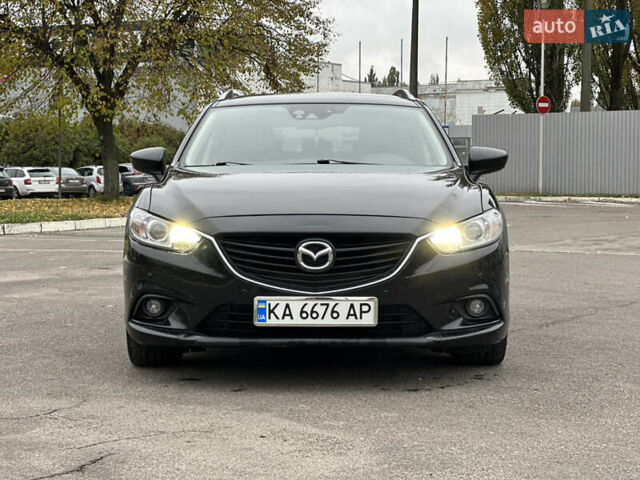 Черный Мазда 6, объемом двигателя 2.19 л и пробегом 220 тыс. км за 9300 $, фото 1 на Automoto.ua