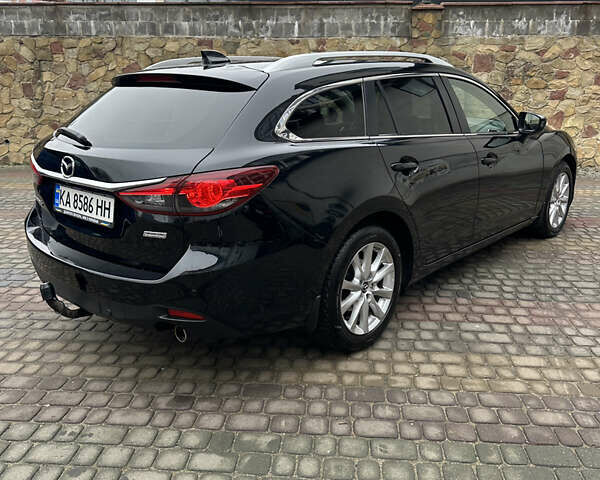 Черный Мазда 6, объемом двигателя 2.2 л и пробегом 266 тыс. км за 10600 $, фото 3 на Automoto.ua