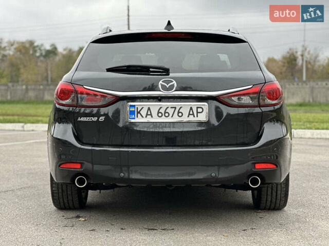 Черный Мазда 6, объемом двигателя 2.19 л и пробегом 220 тыс. км за 9300 $, фото 5 на Automoto.ua