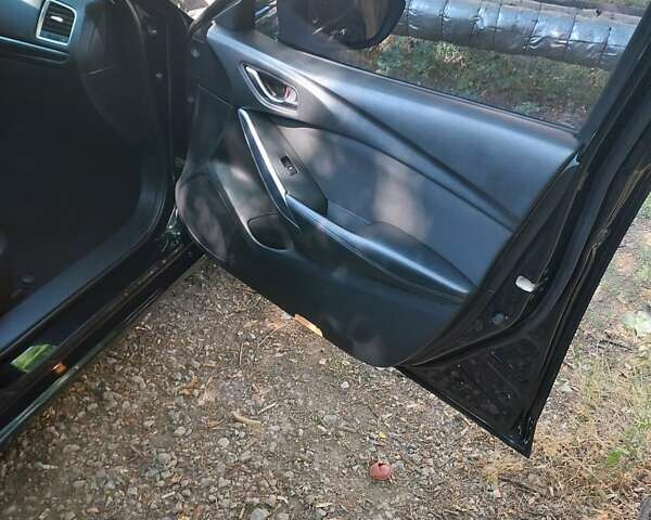 Черный Мазда 6, объемом двигателя 2.19 л и пробегом 270 тыс. км за 10900 $, фото 16 на Automoto.ua