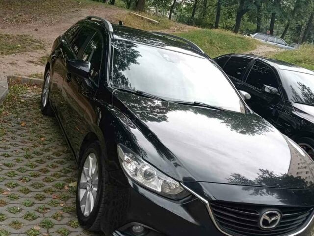 Черный Мазда 6, объемом двигателя 2.18 л и пробегом 260 тыс. км за 11000 $, фото 2 на Automoto.ua