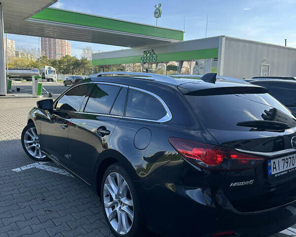 Черный Мазда 6, объемом двигателя 2.18 л и пробегом 256 тыс. км за 12200 $, фото 6 на Automoto.ua