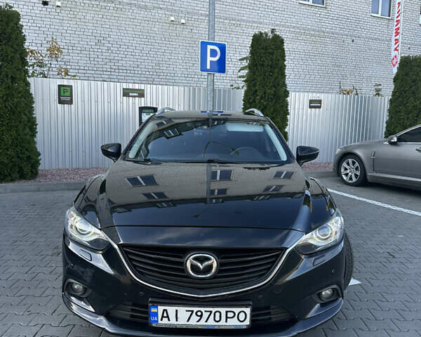 Черный Мазда 6, объемом двигателя 2.18 л и пробегом 256 тыс. км за 12200 $, фото 1 на Automoto.ua
