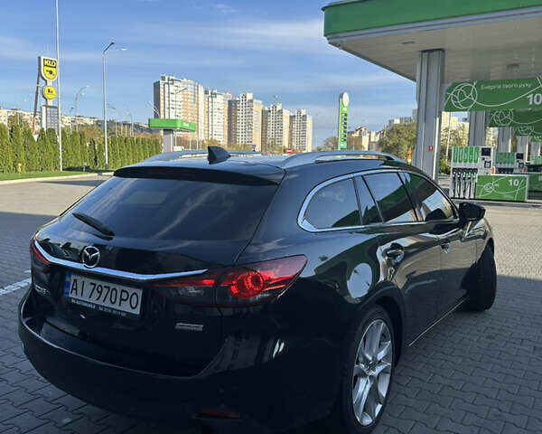 Черный Мазда 6, объемом двигателя 2.18 л и пробегом 256 тыс. км за 12200 $, фото 8 на Automoto.ua