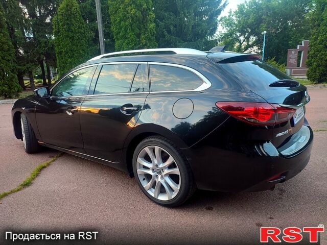 Чорний Мазда 6, об'ємом двигуна 2.2 л та пробігом 26500 тис. км за 10999 $, фото 10 на Automoto.ua