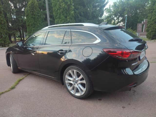 Черный Мазда 6, объемом двигателя 2.2 л и пробегом 265 тыс. км за 10900 $, фото 2 на Automoto.ua