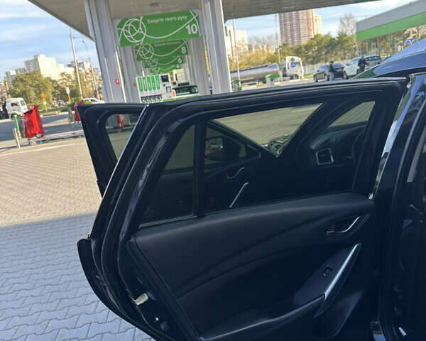 Черный Мазда 6, объемом двигателя 2.18 л и пробегом 256 тыс. км за 12200 $, фото 13 на Automoto.ua