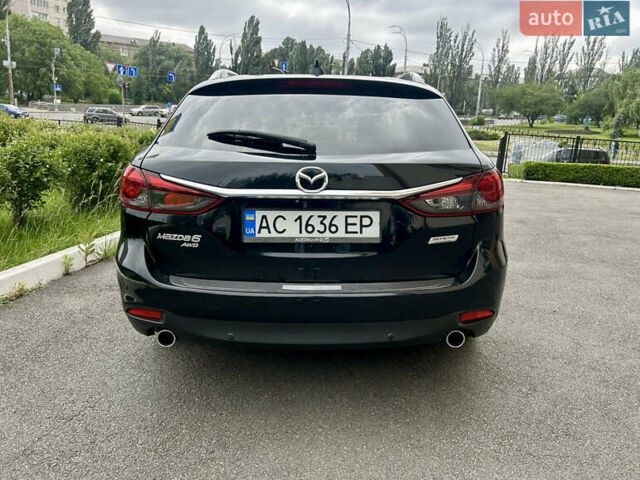 Черный Мазда 6, объемом двигателя 2.18 л и пробегом 247 тыс. км за 13400 $, фото 8 на Automoto.ua