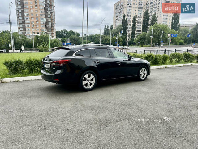 Черный Мазда 6, объемом двигателя 2.18 л и пробегом 247 тыс. км за 13400 $, фото 6 на Automoto.ua