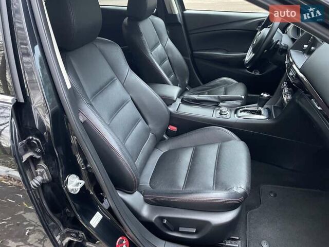 Черный Мазда 6, объемом двигателя 2.18 л и пробегом 175 тыс. км за 11000 $, фото 20 на Automoto.ua